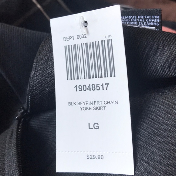 Brand New! Black Skirt with Safety pin and chain embellishments. Size Large - Picture 2 of 3